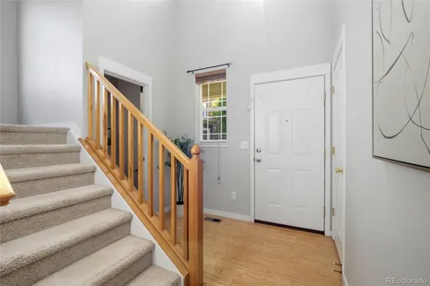 a view of a hallway with staircase