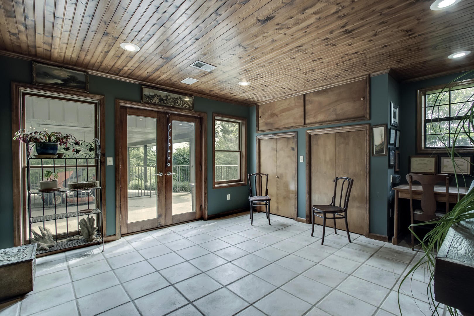 5433 Nickle Road Knoxville, TN 37921 - Photo 30 of 40 a living room with furniture a flat screen tv and a large window
