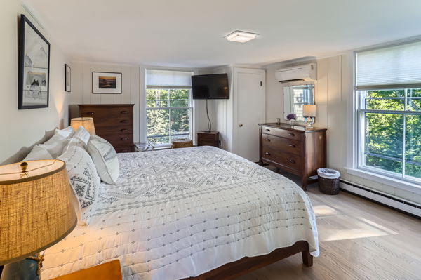 217 Barnes Road Oak Bluffs, MA 02557 - Photo 26 of 60 a bedroom with a bed and window