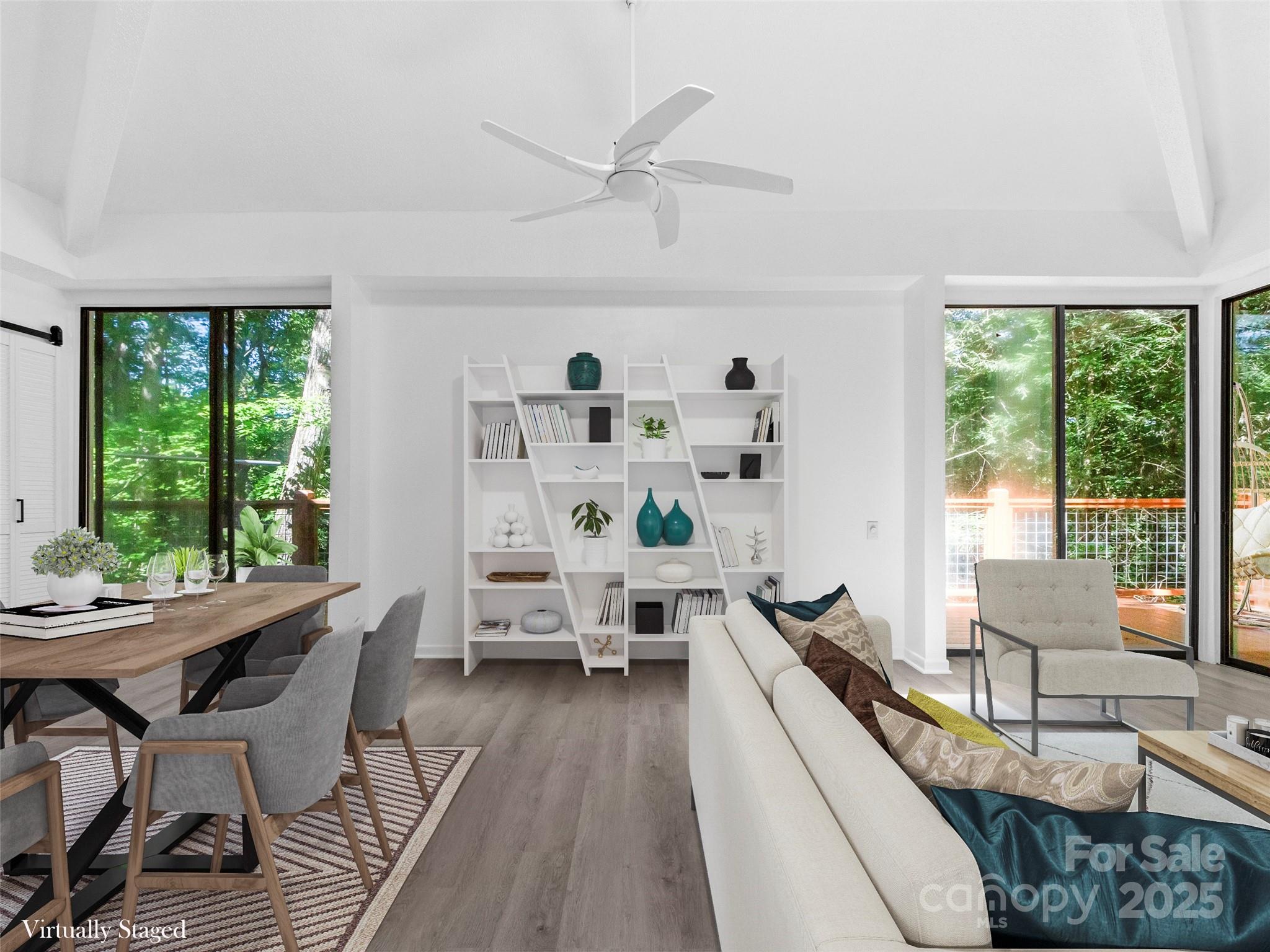 141 Wildflower Road Spruce Pine, NC 28777 - Photo 11 of 22 a living room with furniture and a large window