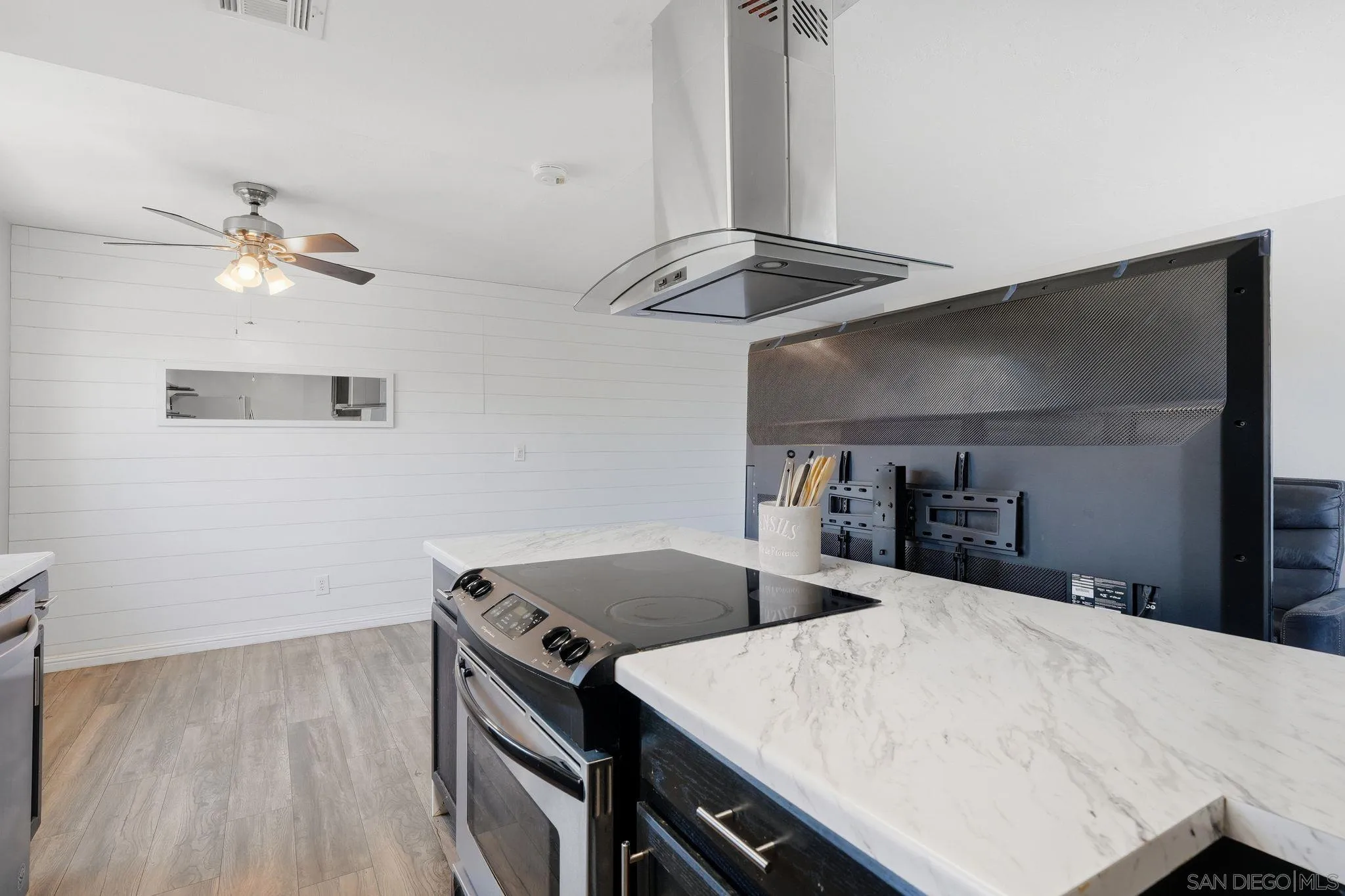 9926 Mission Vega Road, Unit 4 Santee, CA 92071 - Photo 17 of 30 a kitchen with a stove a sink and a refrigerator