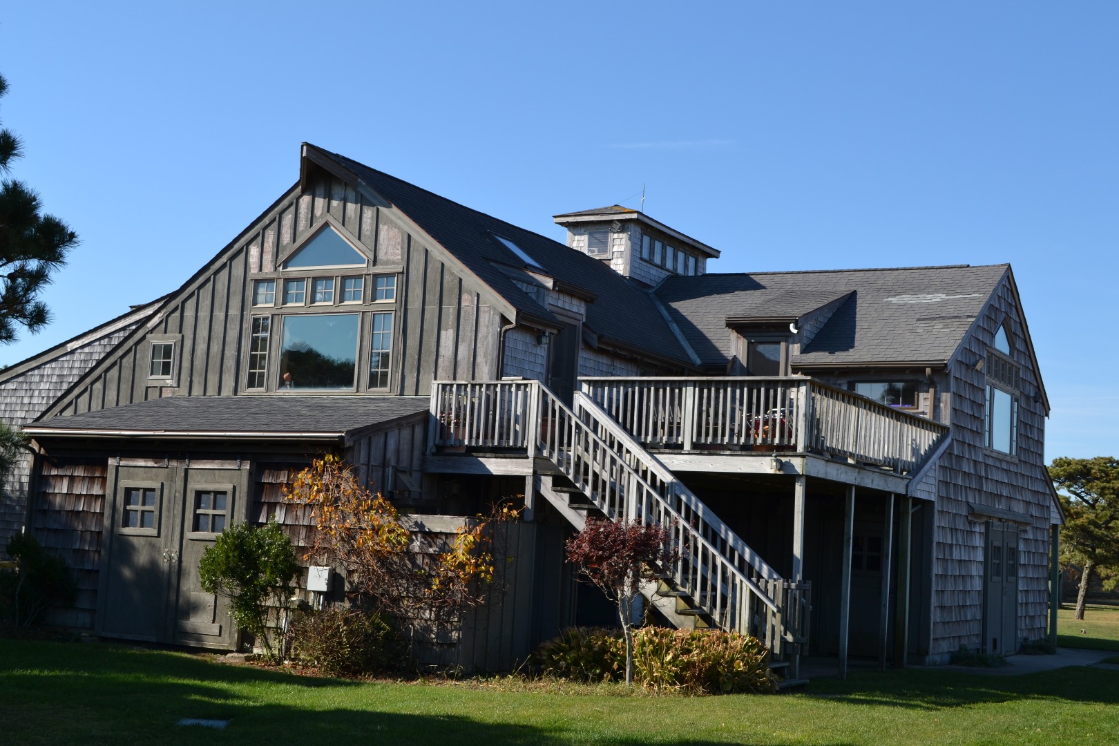 64 South Shore Road Nantucket, MA 02554 - Photo 2 of 15 a front view of house with yard and green space