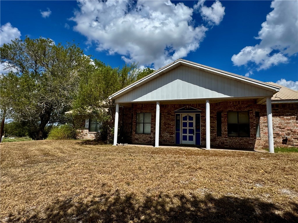 7611 Schramm Road La Grange, TX 78945 - Photo 2 of 30 a front view of a house with a yard