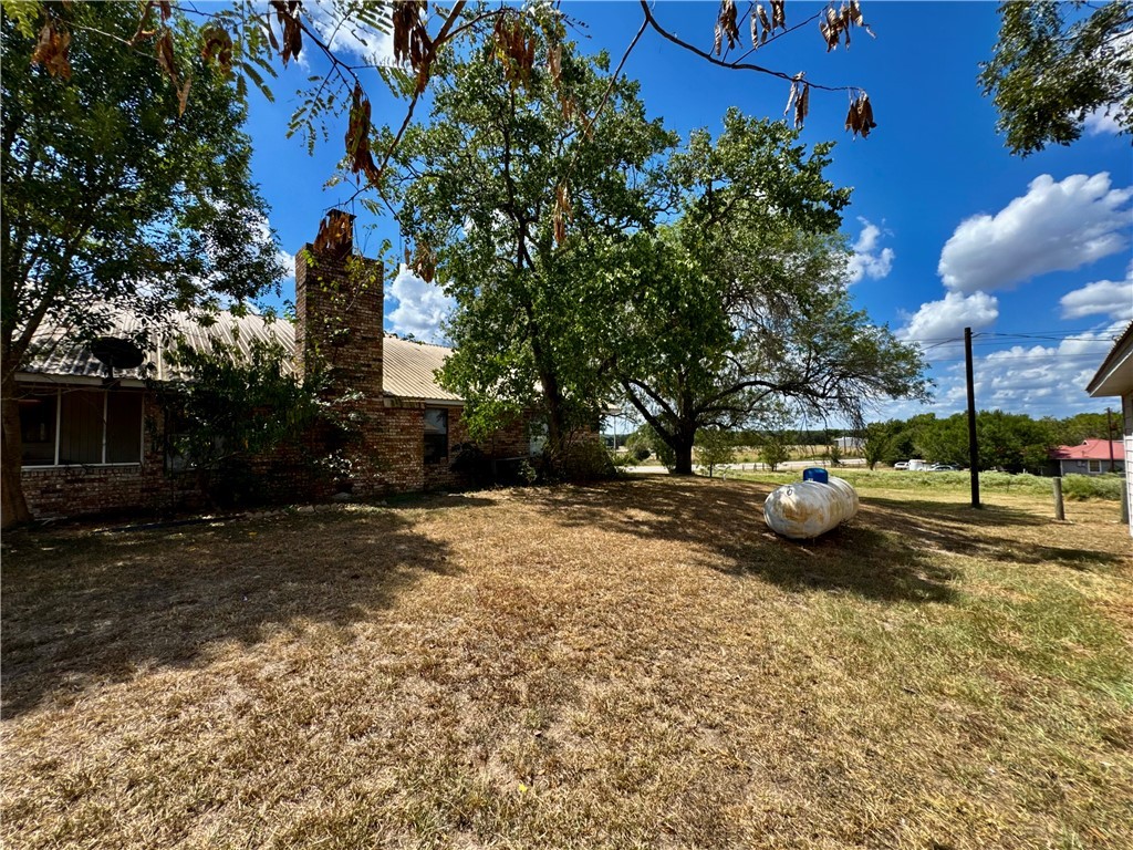 7611 Schramm Road La Grange, TX 78945 - Photo 22 of 30 a view of a street with a cars parked on the road