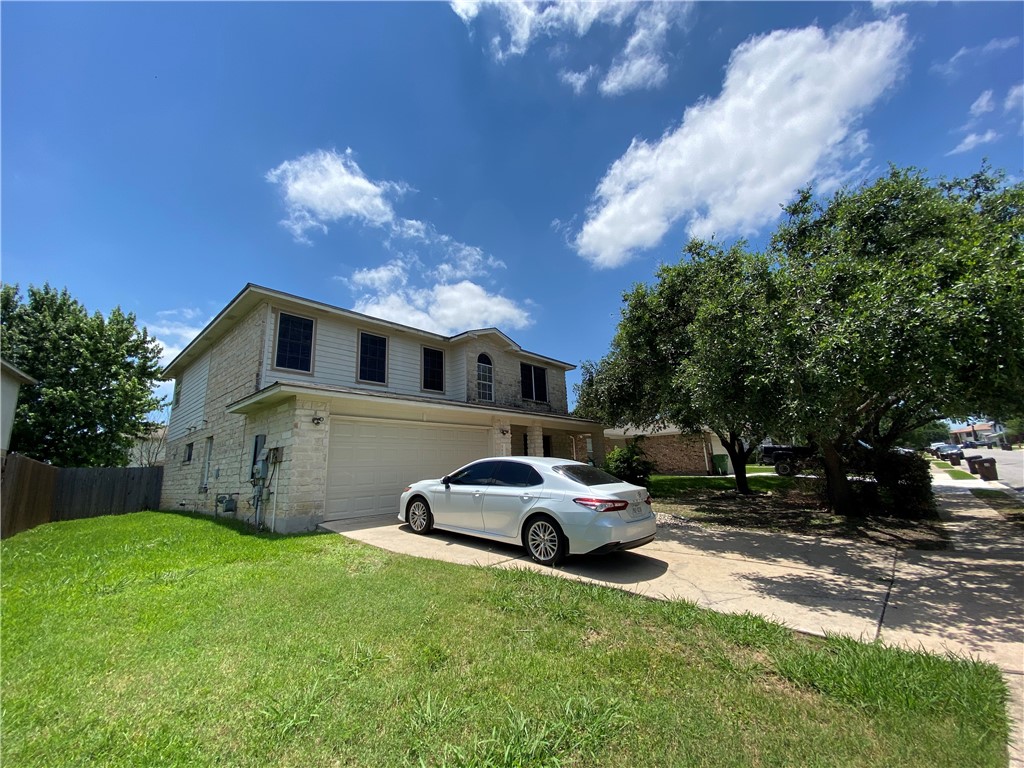 3803 Haleys Way Round Rock, TX 78665 - Photo 1 of 1 a front view of a house with garden