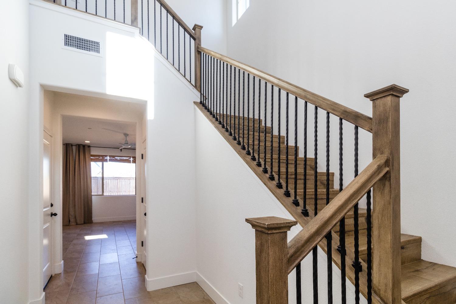 4344 Oak Knoll Road Madera, CA 93636 - Photo 4 of 33 a view of a hallway with wooden floor and entryway