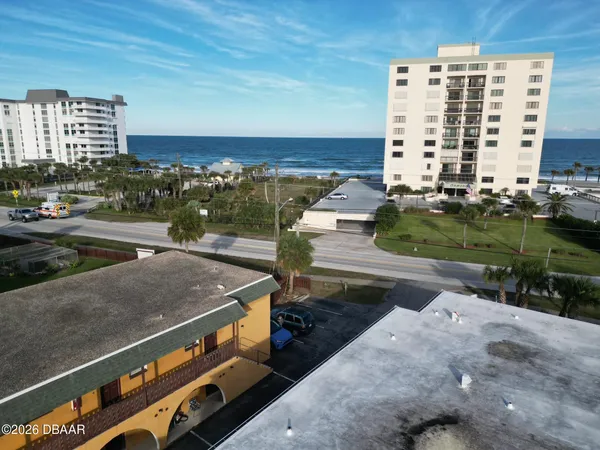 a view of a balcony with an outdoor space