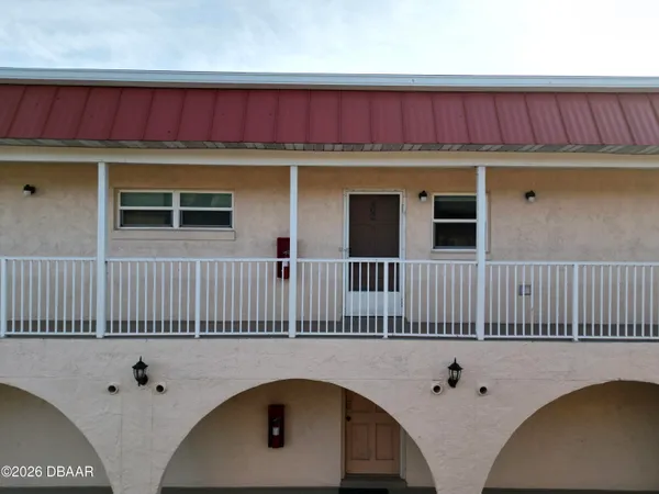 a view of a house with a balcony