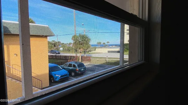 a kitchen with stainless steel appliances kitchen island sink refrigerator and stove