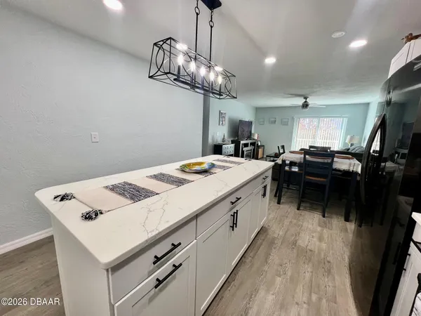 a kitchen with a stove and a microwave