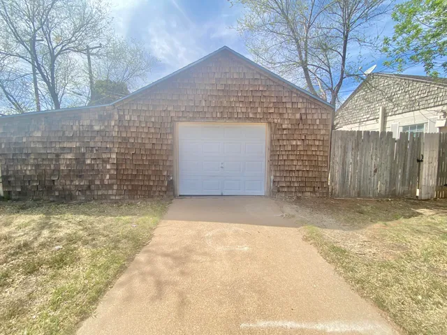 a front view of a house with a garage