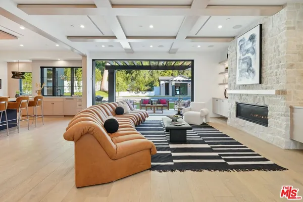 a kitchen with cabinets and white appliances