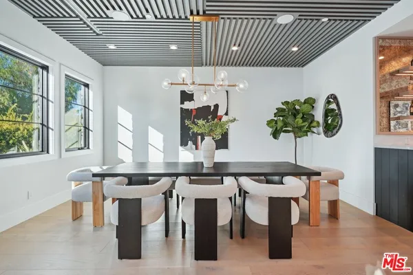 a living room with furniture a window and a fireplace