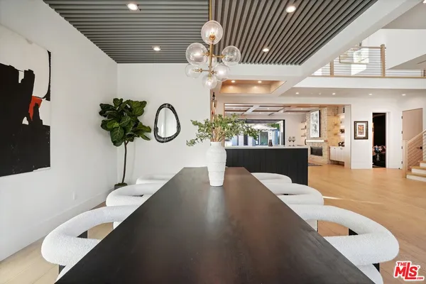 a bathroom with a sink a mirror and a toilet