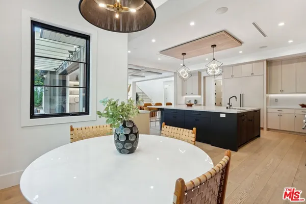 a bed room with a bed and a chair