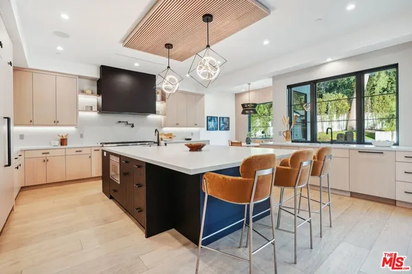 a view of a house with a backyard and dining room