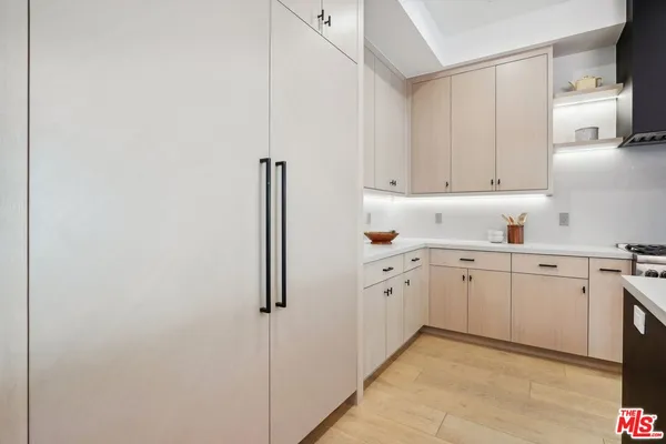 a front view of a house with a yard table and chairs