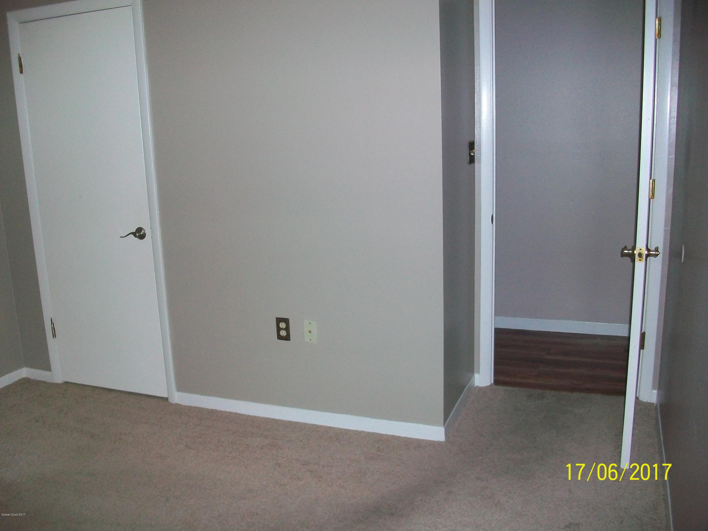 109 Tucson Road Southwest Palm Bay, FL 32908 - Photo 11 of 31 Bedroom 2 closet