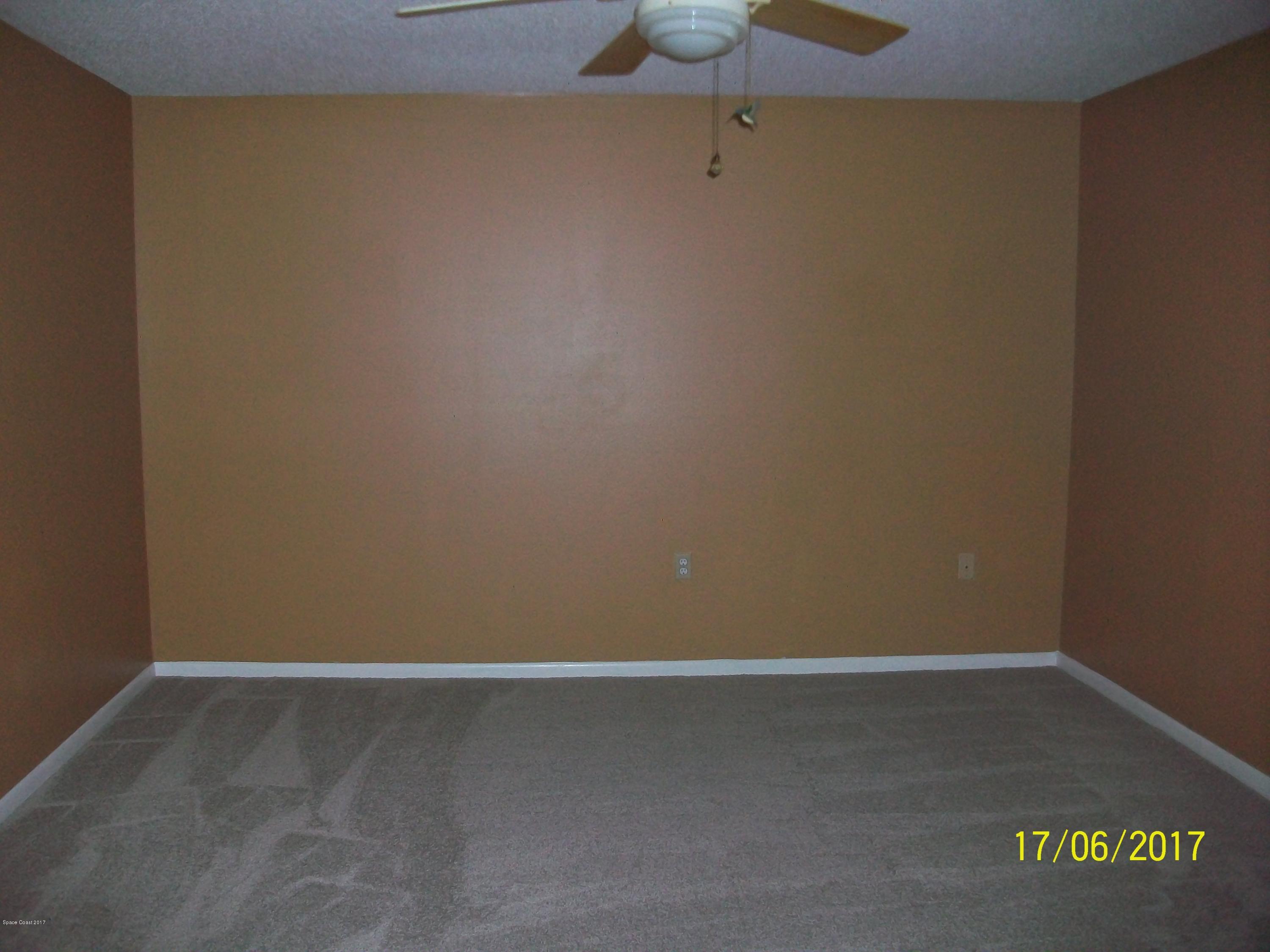 109 Tucson Road Southwest Palm Bay, FL 32908 - Photo 14 of 31 Master Bedroom