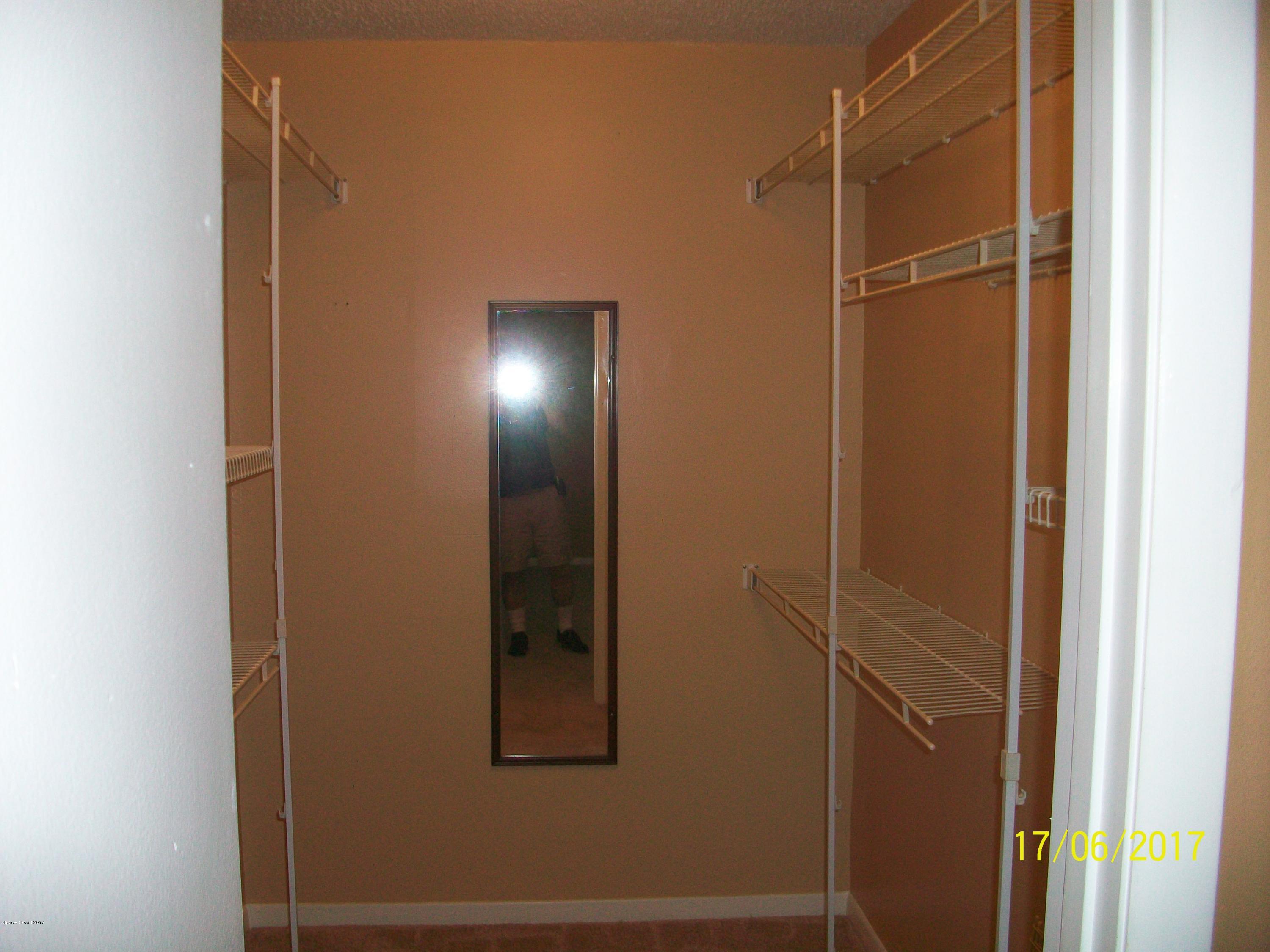 109 Tucson Road Southwest Palm Bay, FL 32908 - Photo 17 of 31 Master Walk-in closet