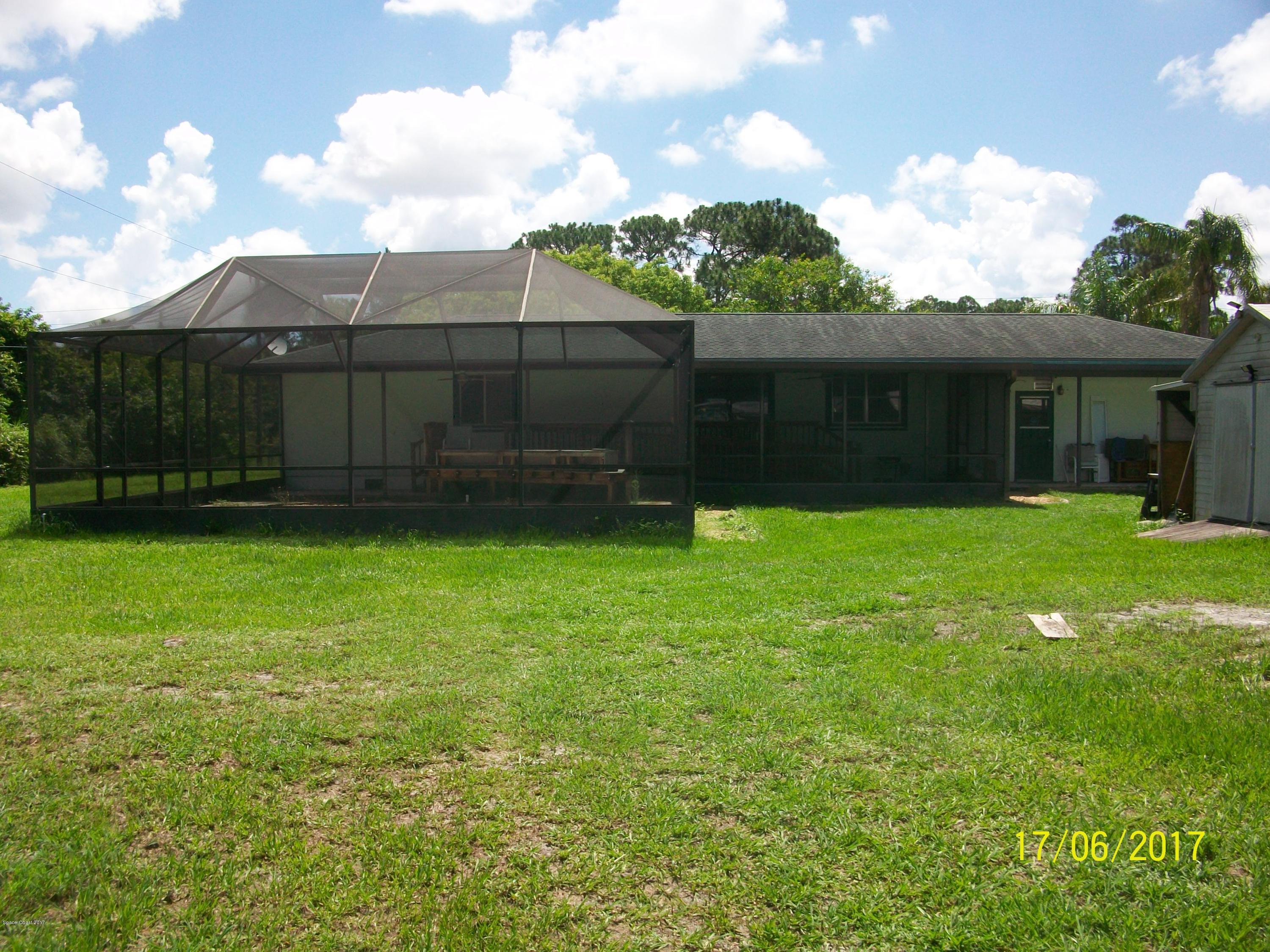 109 Tucson Road Southwest Palm Bay, FL 32908 - Photo 25 of 31 Rear view