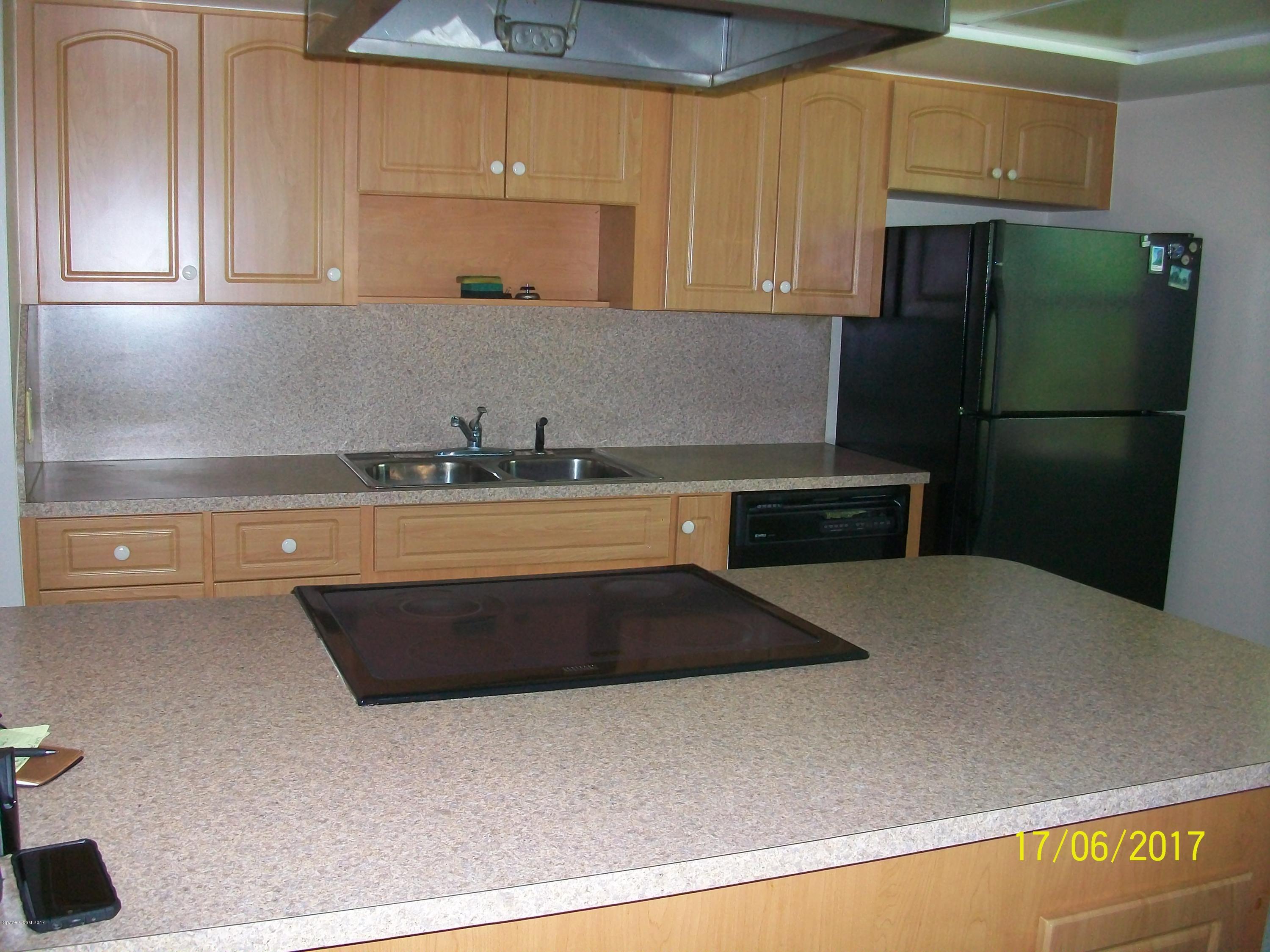 109 Tucson Road Southwest Palm Bay, FL 32908 - Photo 5 of 31 Cook top Island