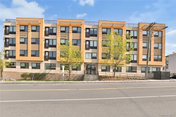 a view of building with a street