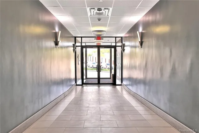 a view of entryway with a front door