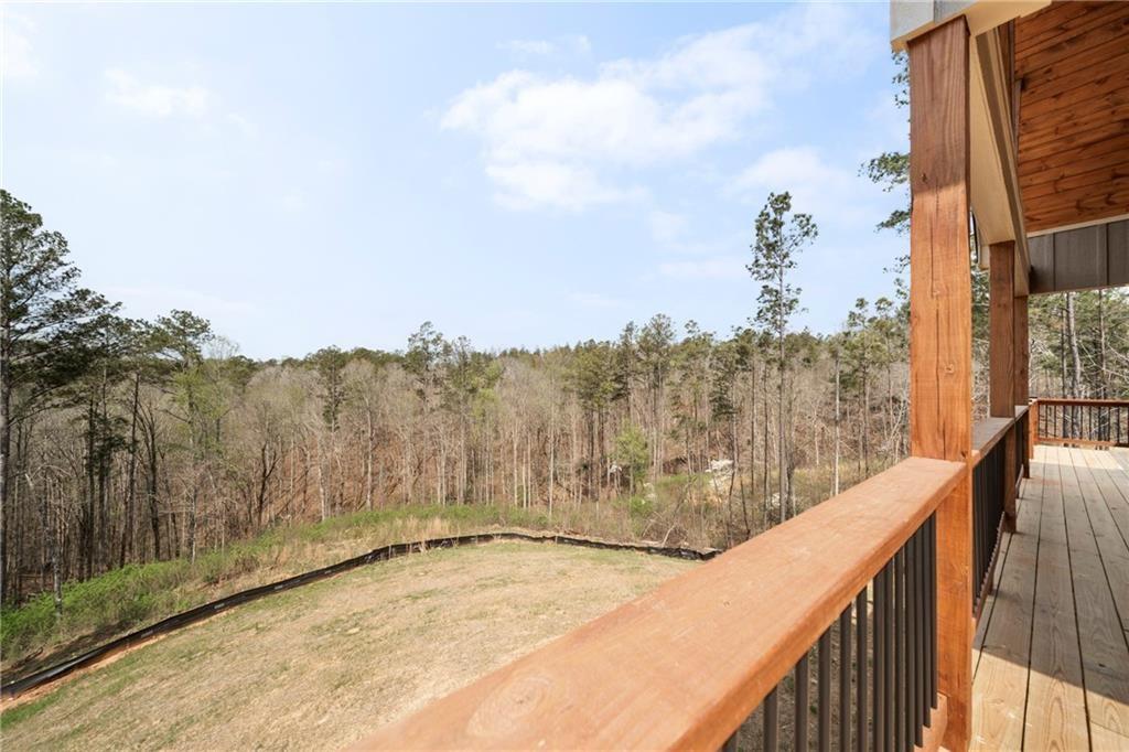 2956 Blalock Mountain Road Talking Rock, GA 30175 - Photo 25 of 63 a view of a balcony with trees