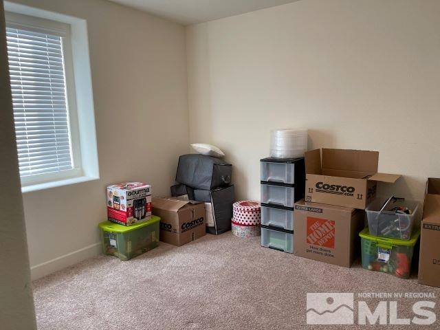 2071 Whitecliff Drive Reno, NV 89521 - Photo 13 of 24 a living room with furniture and a flat screen tv