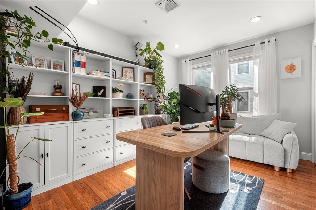 78-80 Rossmore Road, Unit 2 Boston, MA 02130 - Photo 11 of 19 a living room with furniture and wooden floor