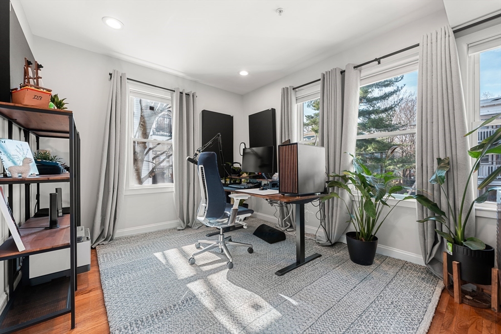78-80 Rossmore Road, Unit 2 Boston, MA 02130 - Photo 15 of 19 a view of a livingroom with workspace and a window