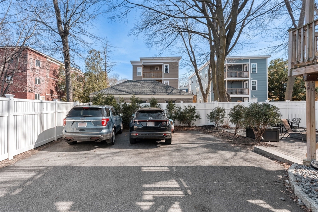 78-80 Rossmore Road, Unit 2 Boston, MA 02130 - Photo 19 of 19 a car parked in front of a building