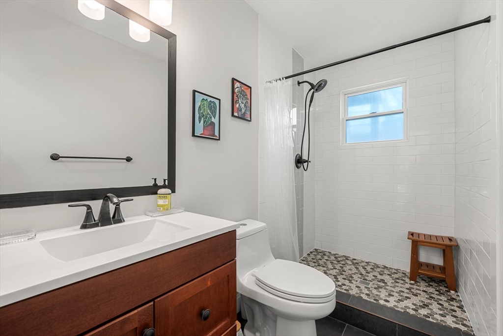 78-80 Rossmore Road, Unit 2 Boston, MA 02130 - Photo 10 of 19 a bathroom with a sink toilet and shower