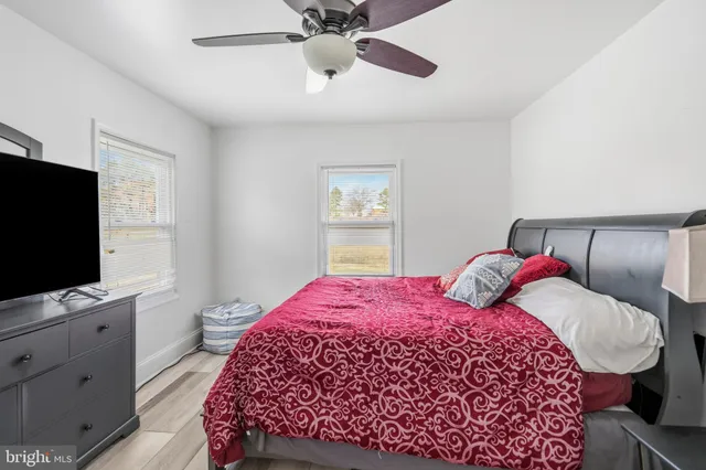 a kitchen with granite countertop a sink and cabinets