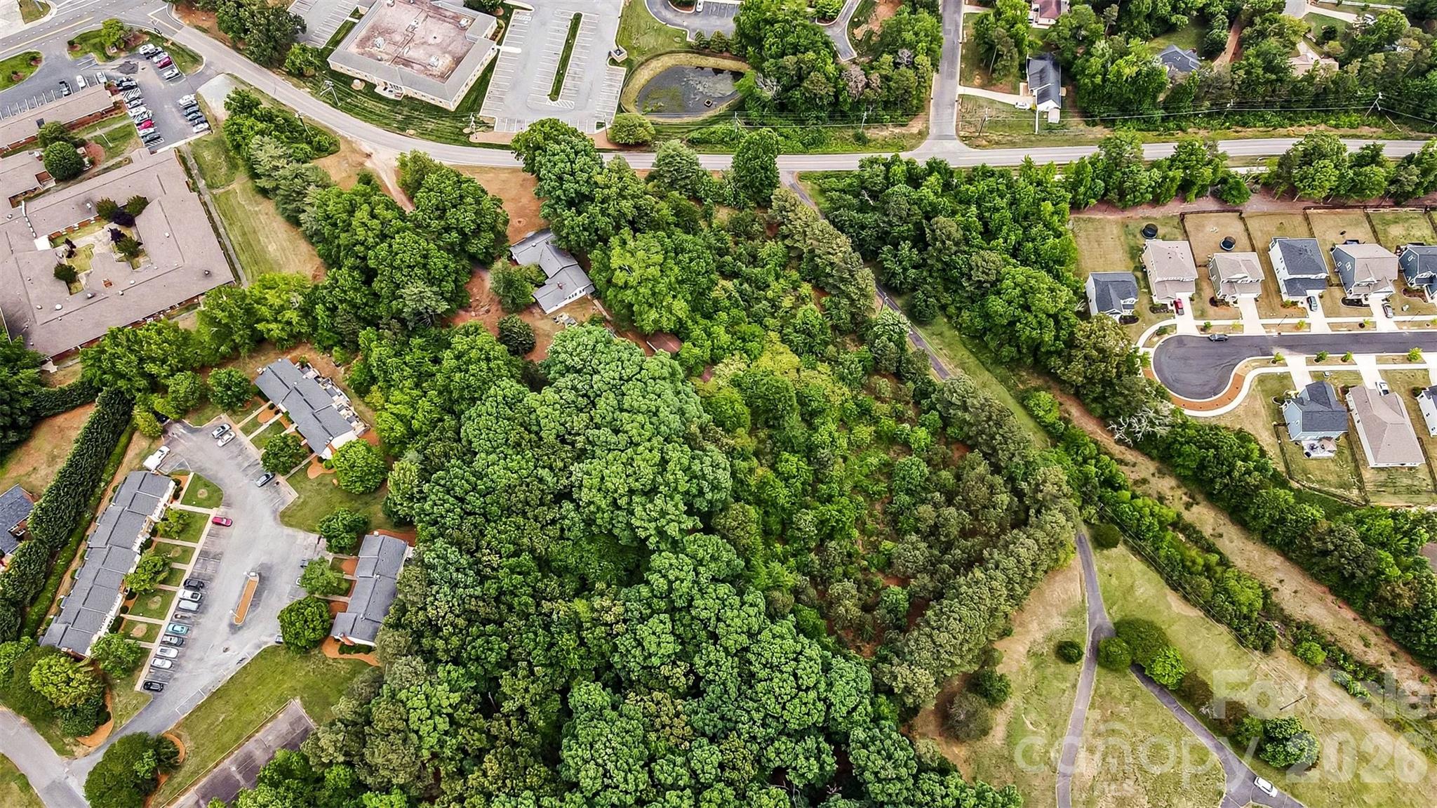 1116 Medlin Road Monroe, NC 28112 - Photo 39 of 40 an aerial view of residential house with outdoor space and trees all around