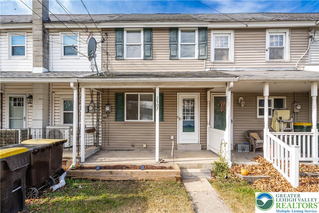 2507 Levans Road Coplay, PA 18037 - Photo 1 of 46 a front view of a house with a yard