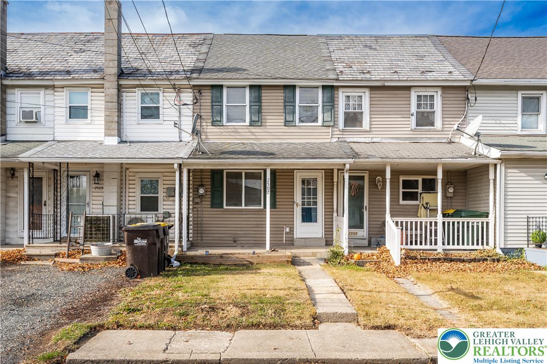 2507 Levans Road Coplay, PA 18037 - Photo 2 of 46 front view of a brick house
