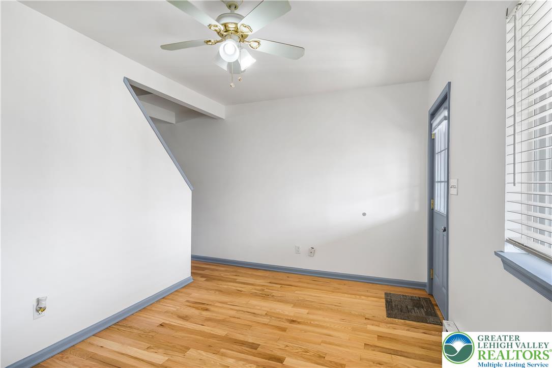 2507 Levans Road Coplay, PA 18037 - Photo 23 of 46 a view of an empty room with wooden floor and a window