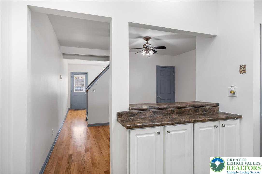 2507 Levans Road Coplay, PA 18037 - Photo 28 of 46 a bathroom with a granite countertop sink a mirror and shower