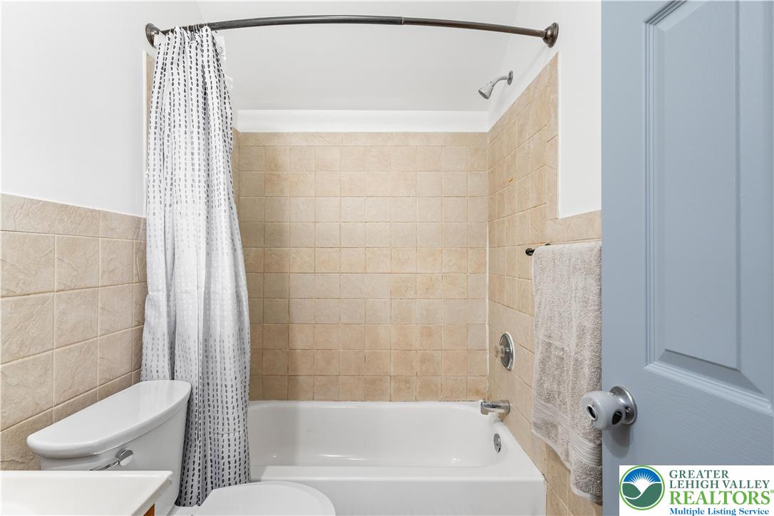 2507 Levans Road Coplay, PA 18037 - Photo 44 of 46 a bathroom with a bathtub and a shower