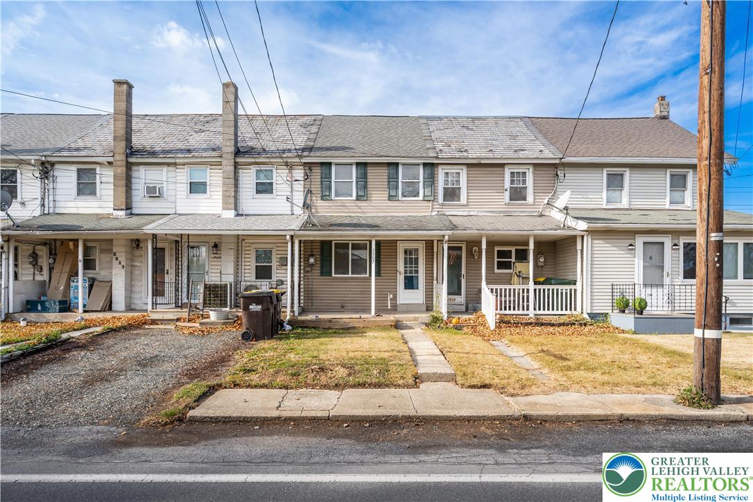 2507 Levans Road Coplay, PA 18037 - Photo 8 of 46 a front view of a building with a garden
