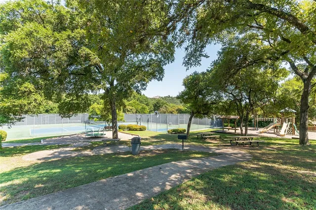 a view of a park with swings