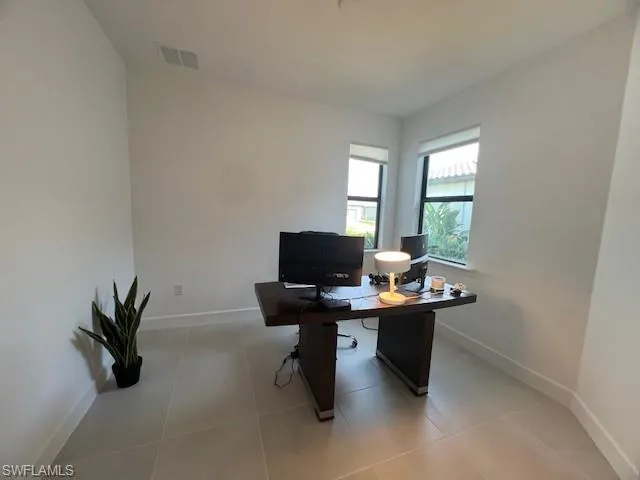 a view of a workspace with a window