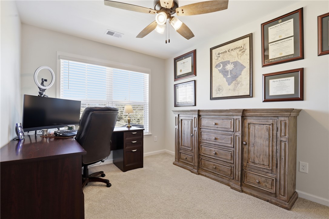 349 Stirrup Court Greer, SC 29651 - Photo 18 of 27 This versatile room offers comfort and functionality, ideal for productivity and relaxation.