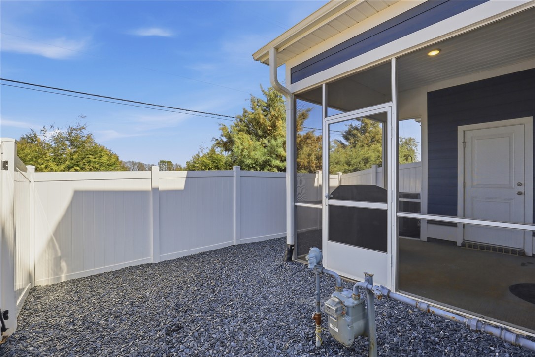 349 Stirrup Court Greer, SC 29651 - Photo 23 of 27 Enjoy outdoor living with a spacious screened porch, perfect for relaxation or entertaining.