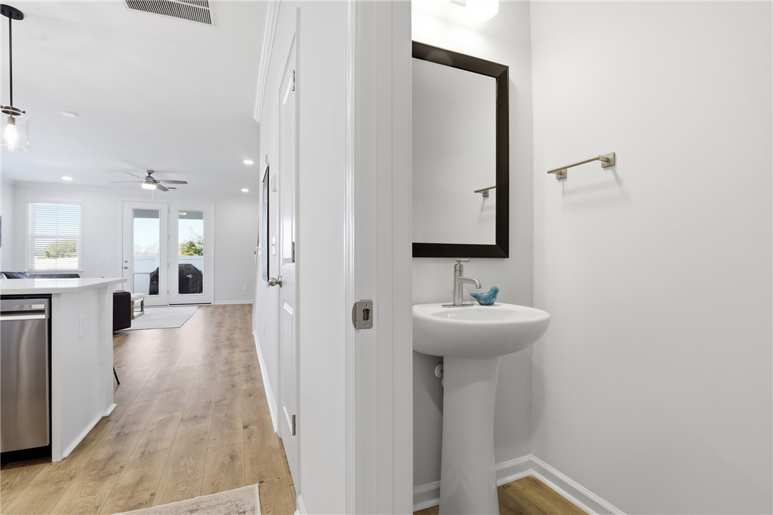 349 Stirrup Court Greer, SC 29651 - Photo 3 of 27 This bright and airy space offers seamless flow and a convenient half bath, perfect for guests.