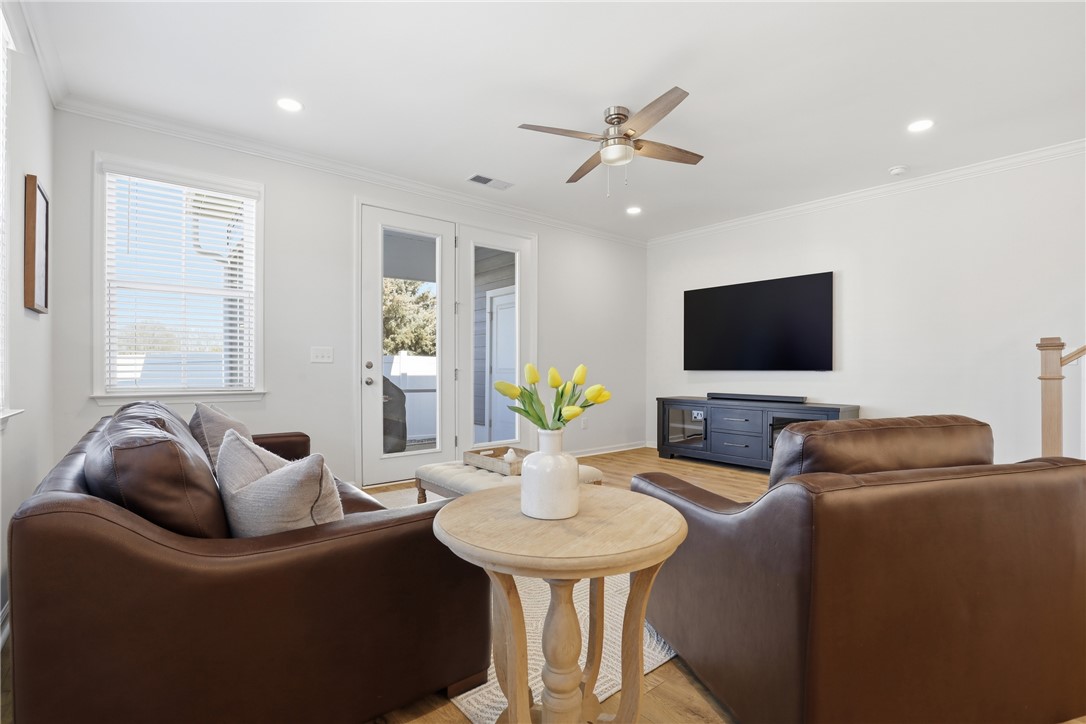 349 Stirrup Court Greer, SC 29651 - Photo 9 of 27 This bright living space offers comfort and access to outdoor areas.