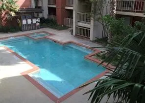 a view of backyard with patio