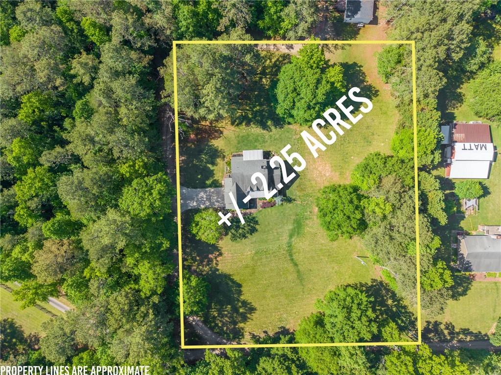 5822 John Burruss Road Cumming, GA 30040 - Photo 7 of 65 an aerial view of residential house with an outdoor space